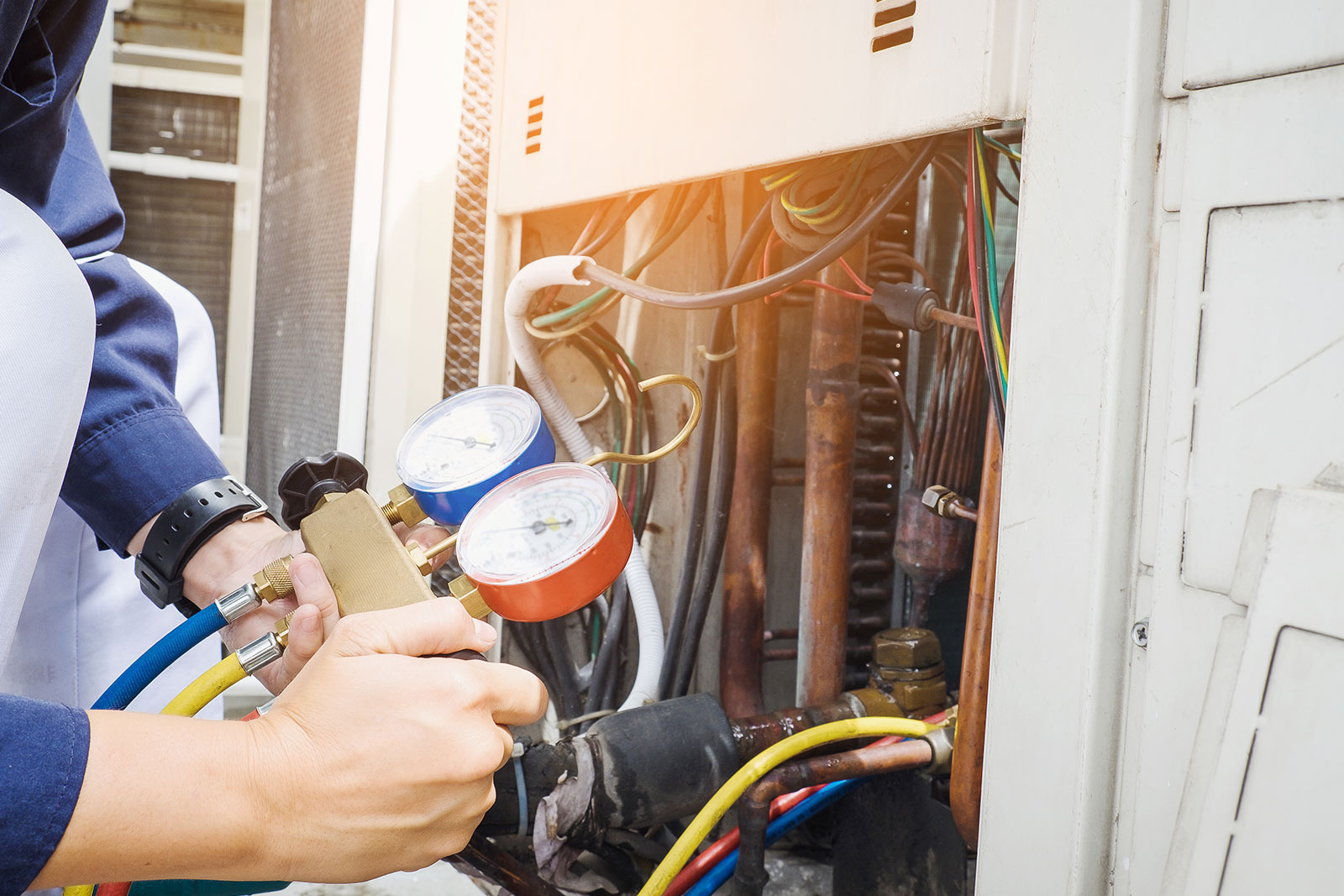 Technician repairing a home furnace in Lancaster County, PA
